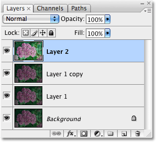 The three layers have been merged onto a new layer above them in the Layers palette. Image © 2009 Photoshop Essentials.com.