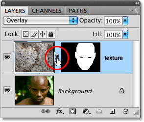 Unlinking the layer contents from the layer mask in Photoshop.