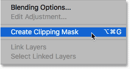 Choosing the Create Clipping Mask command in Photoshop