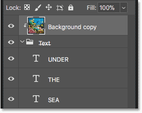 The image is clipped to the Text layer group in Photoshop