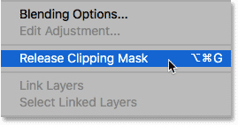 Choosing the Release Clipping Mask command from the Layers panel menu